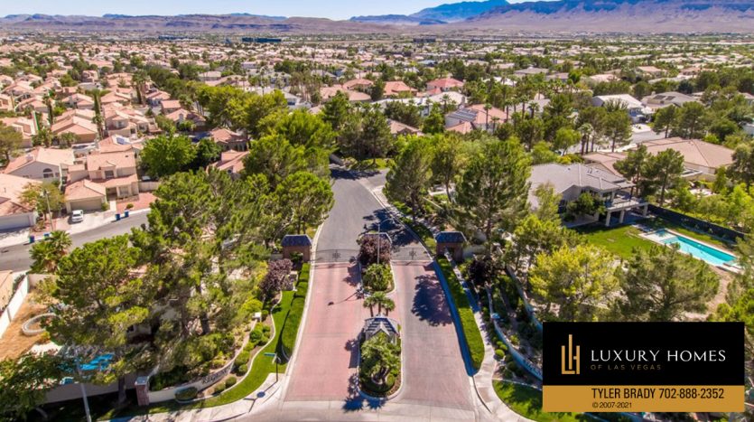 entrance road at Regency at The Lakes home for sale, 9904 Aspen Knoll Ct, Las Vegas