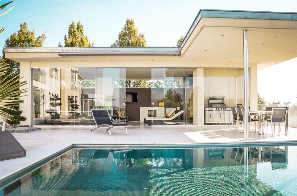 A beautiful luxury home with a pool