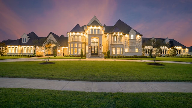 Huge luxury home in the suburbs with a large green lawn