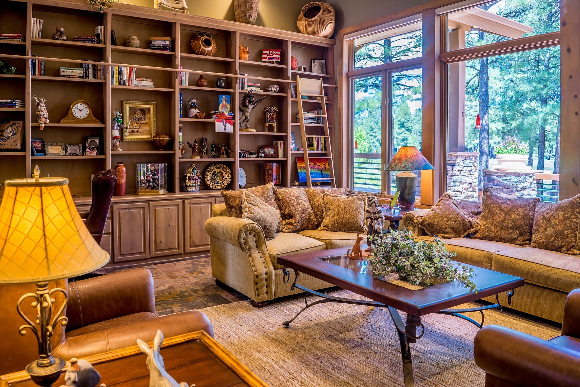 A cozy living room with a large bookshelf