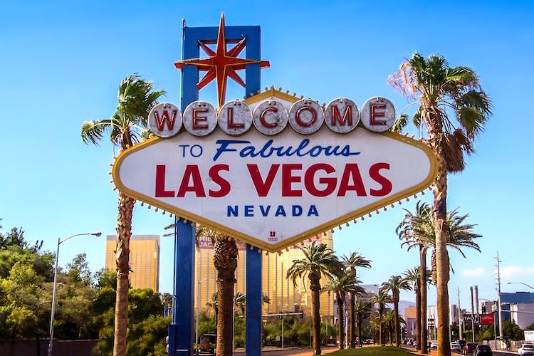 A big colorful sign that says WELCOME TO LAS VEGAS