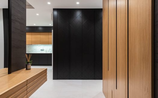 Large walk-in wood and black closet