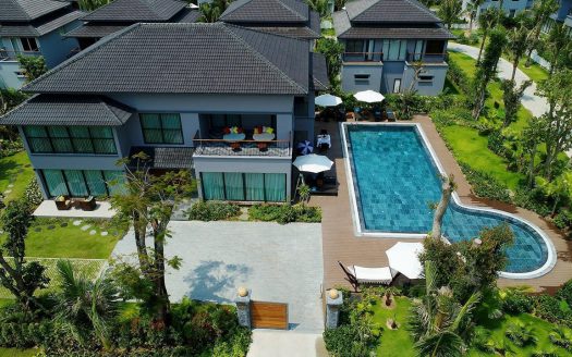A luxurious home with a garden and swimming pool